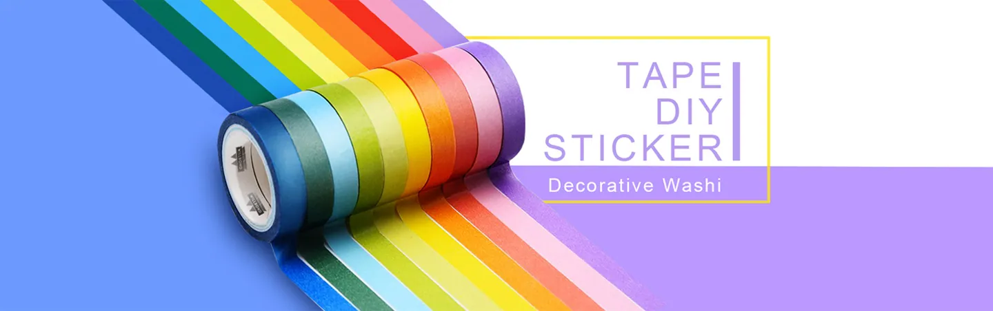Rolls of decorative tape unrolled in a colour sequence