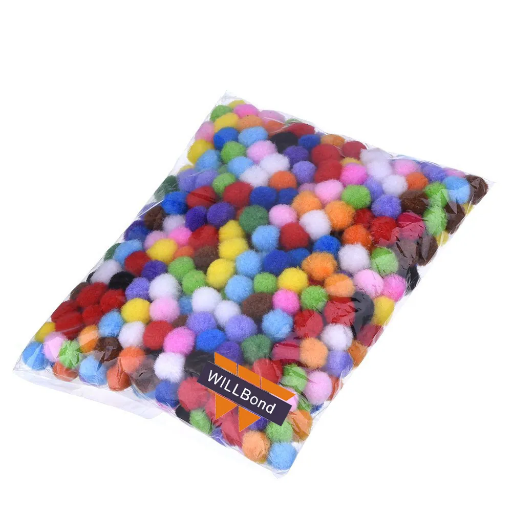 A packed bag of mixed pom-poms photographed on a plain surface