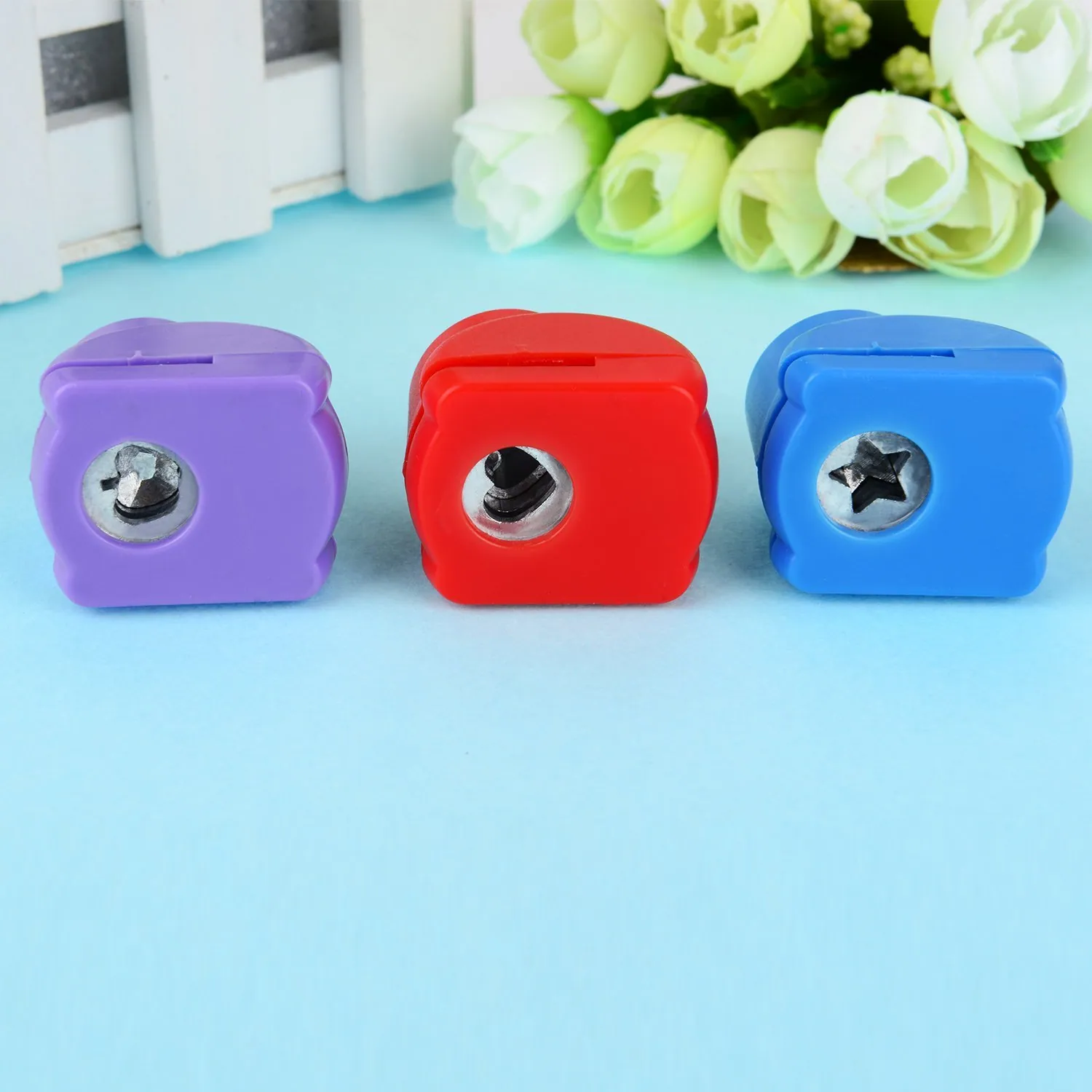 Cube sharpeners in three colours